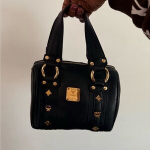 MCM Black Mini Bag with Gold Accents